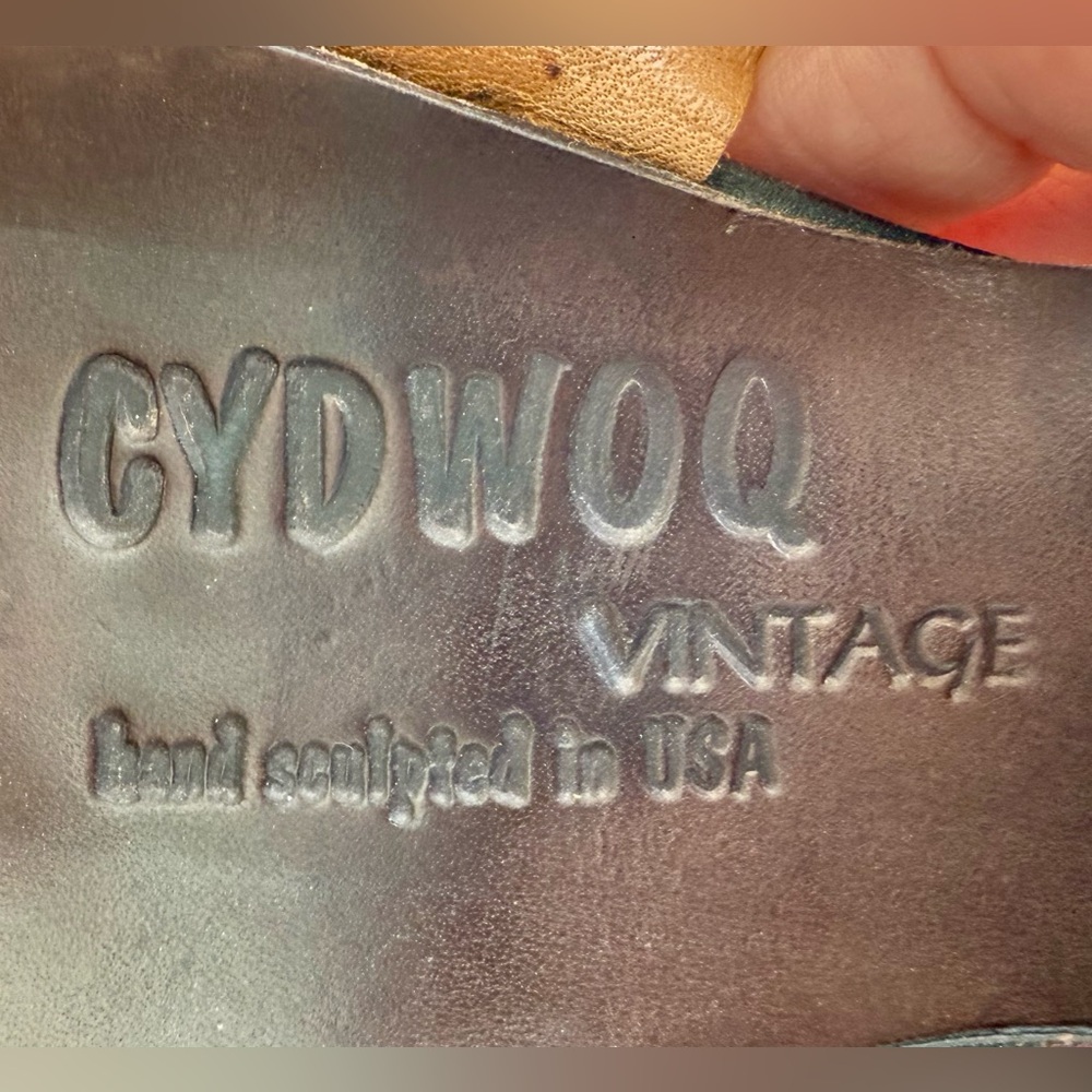 CYDWOQ handmade leather ankle strap sandals.